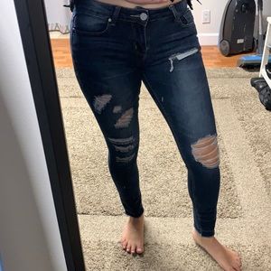 Dark blue denim, stretchy & distressed, ankle length cut off jeans. Size 7